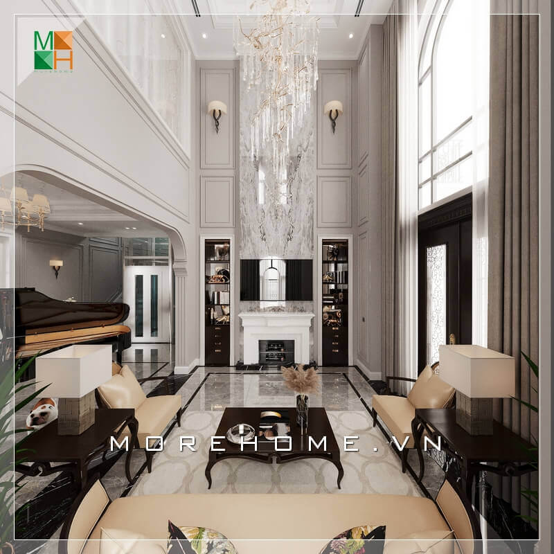 Không gian phòng khách tráng lệ, với mẫu bàn ghế sofa phòng khách sử dụng chất liệu bàn là gỗ tự nhiên cao cấp, ghế sofa bọc da chân ghế sang trọng. Tất cả tạo nên một không gian phòng khách rất hoành tráng và đẳng cấp. Nội thất chung cư tân cổ điển đẹp
