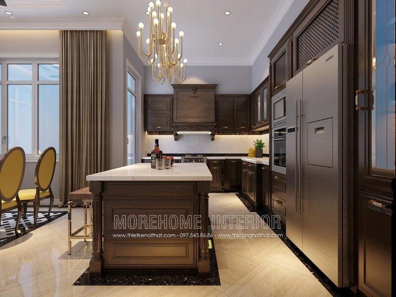 Thiết kế tủ bếp chữ L tận dụng được tối đa mọi góc khuất của căn phòng, chiếc bàn đảo được đặt ở chính giữa là tích hợp của nhiều chức năng như quầy bar, bàn ăn phụ...tạo sự tiện nghi