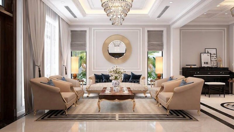Bộ bàn ghế sofa tân cổ điển mạ vàng tone trắng sữa nhẹ nhàng nhưng lại tạo điểm nhấn đẹp, sang trọng cho phòng khách.